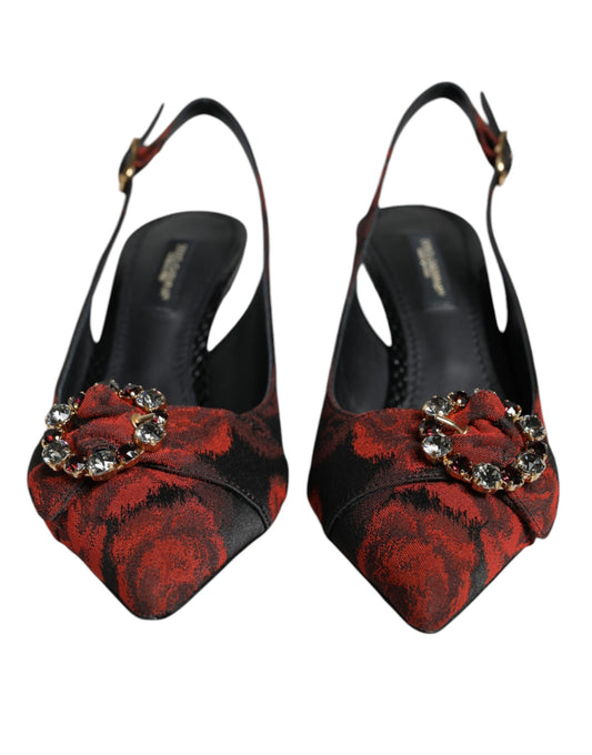 Pair of high heel shoes with red and black design