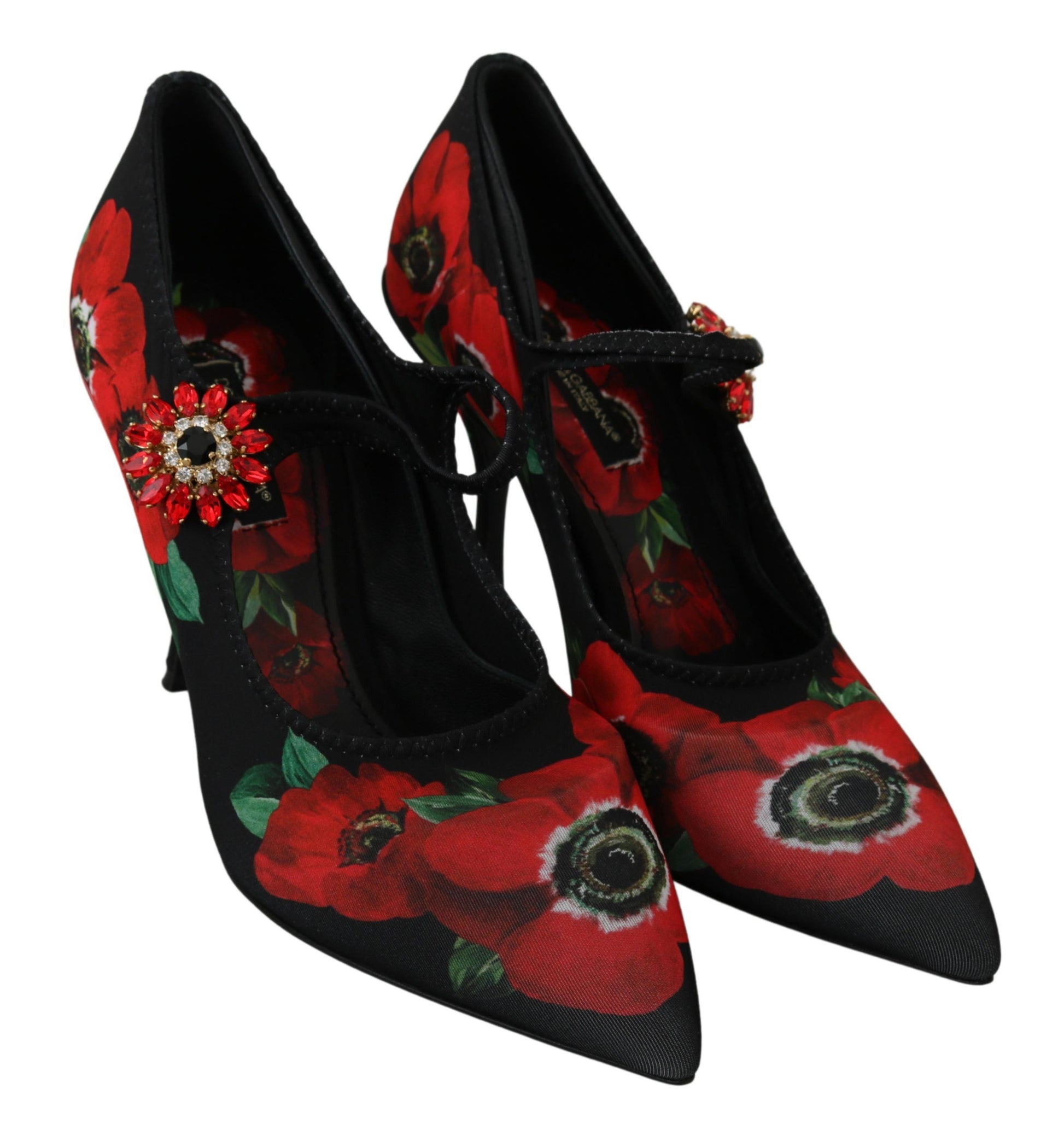 Pair of black high heel shoes with red flower pattern and rhinestone accents