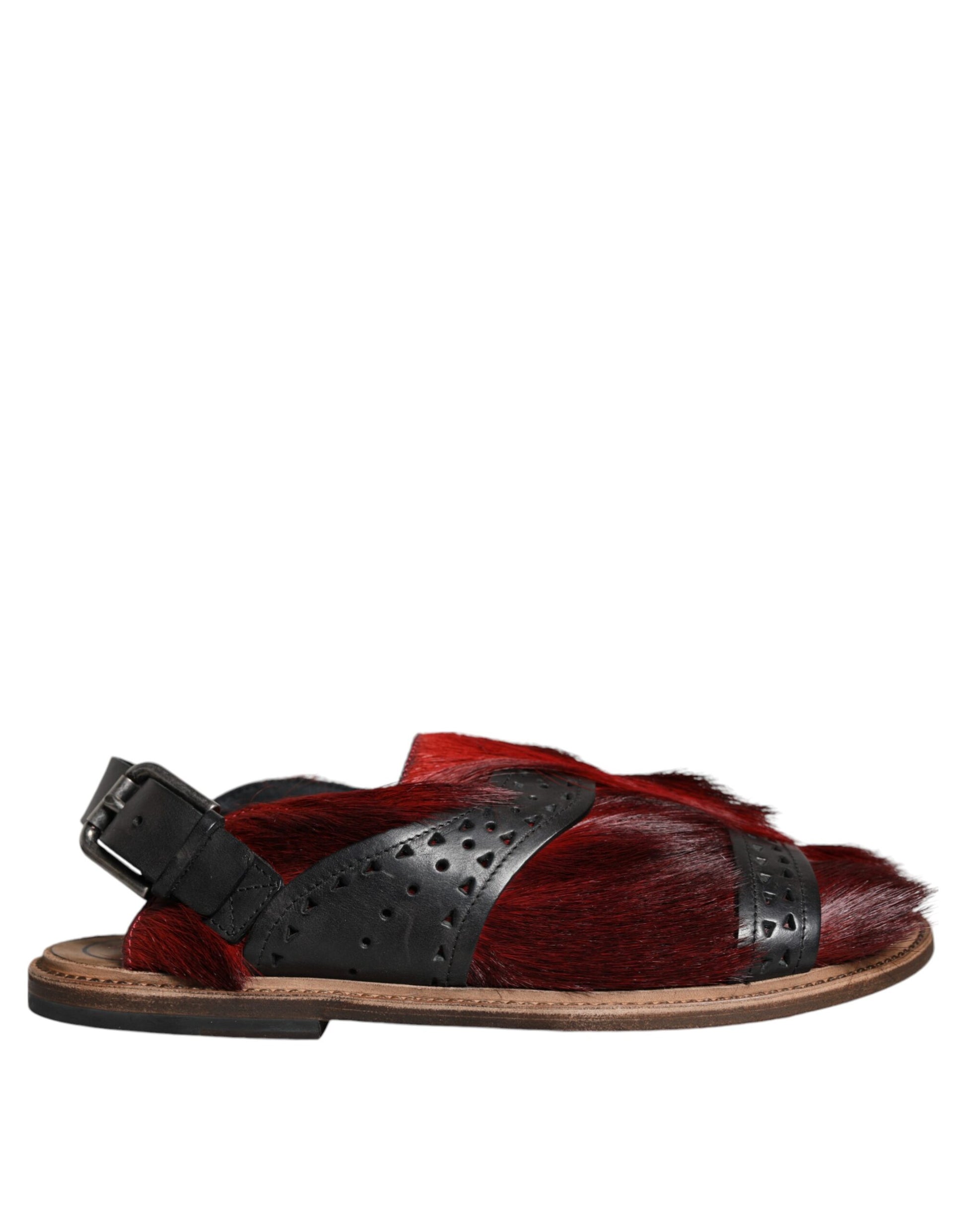 Red sandal with black strap and buckle