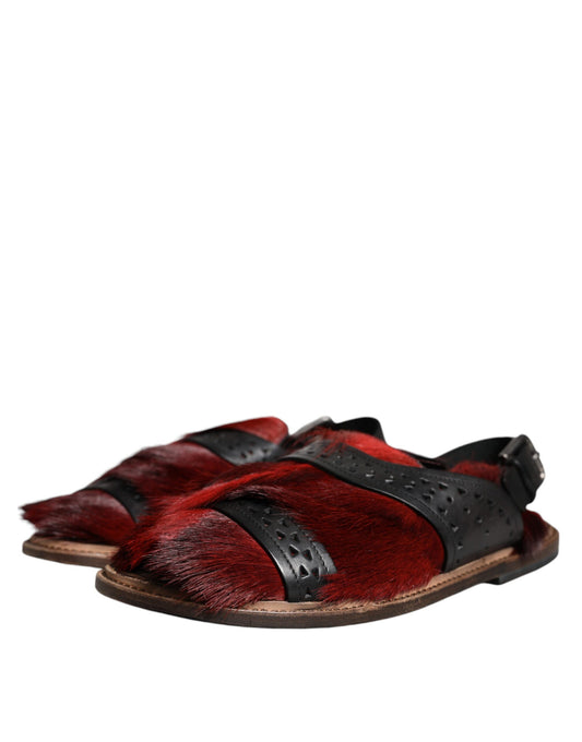 Red furry sandals with black straps