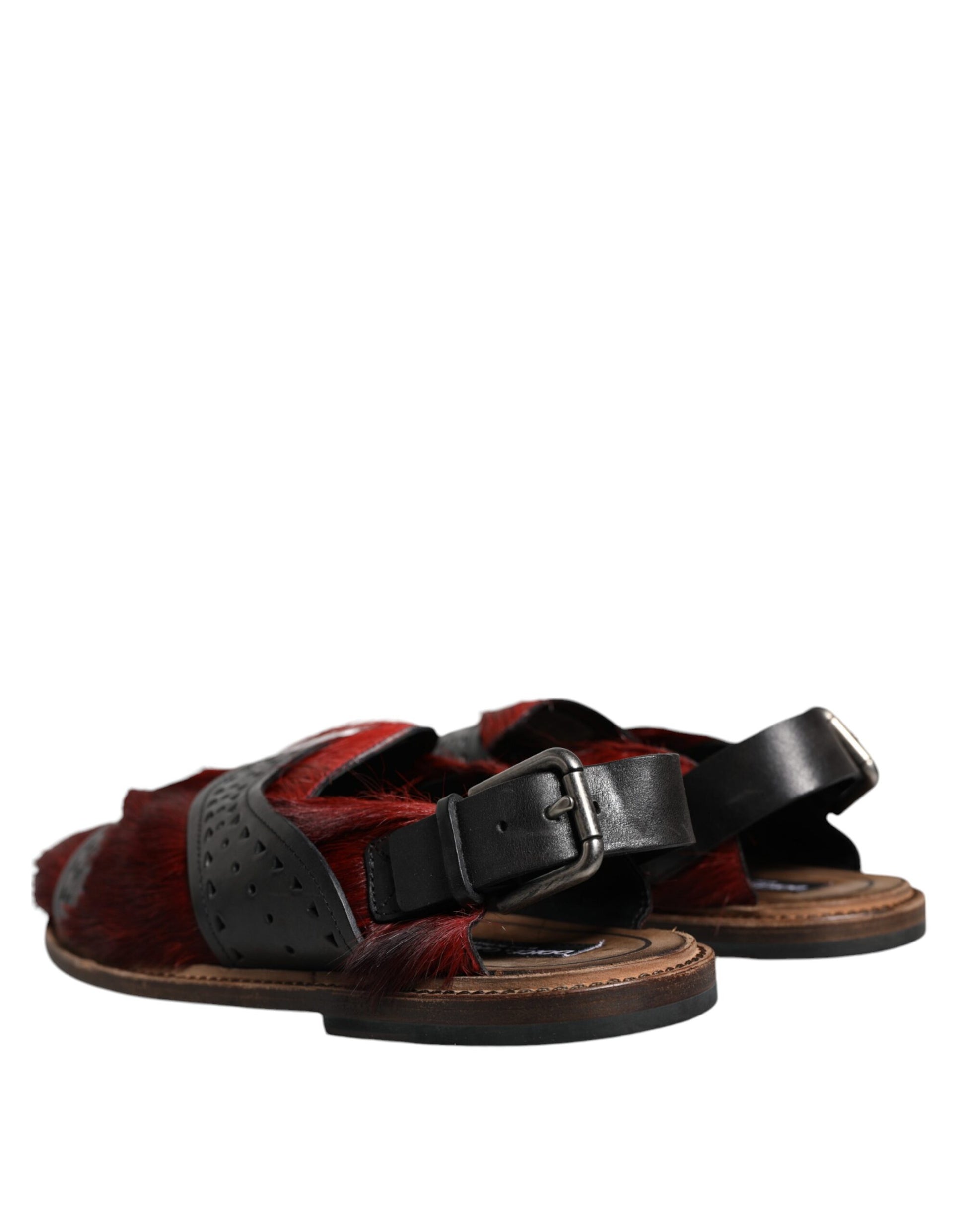 Pair of brown sandals with black straps