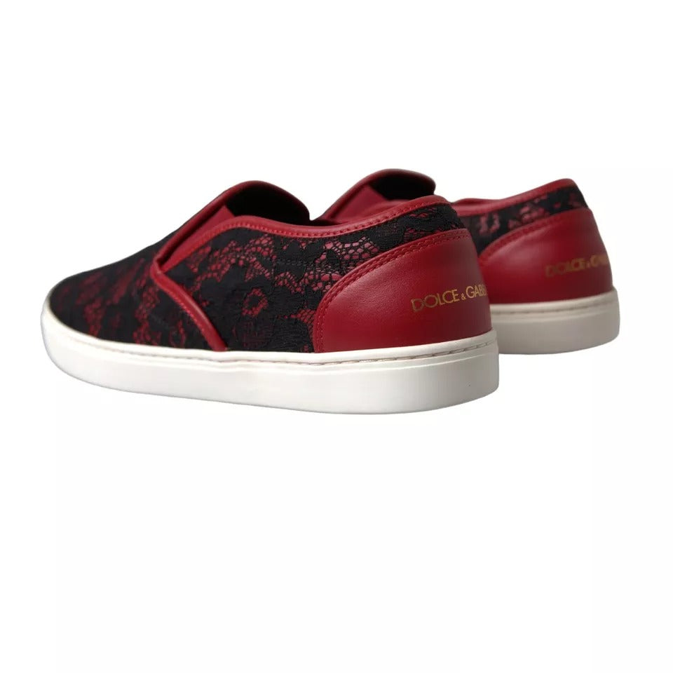 Pair of black red lace slip on low top shoes with gold logo