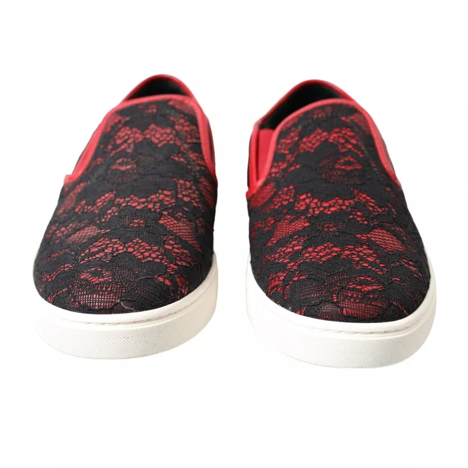 A pair of red and black lace-up slip-on shoes with a patterned design