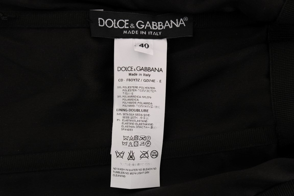 A black sequined dress with red polka dots from Dolce & Gabbana