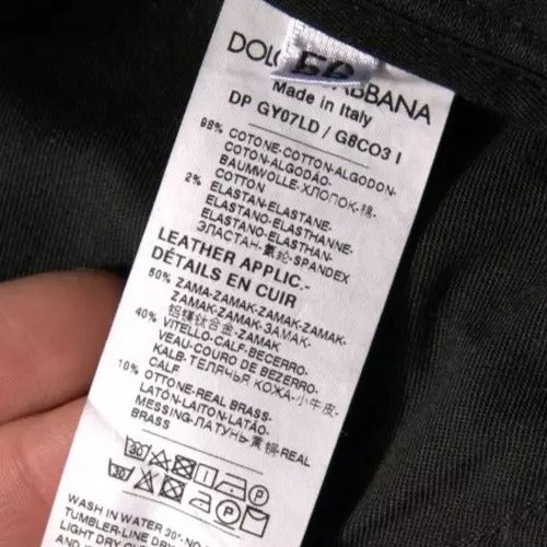 Tag on clothing item indicating brand, material, care instructions, and country of manufacture