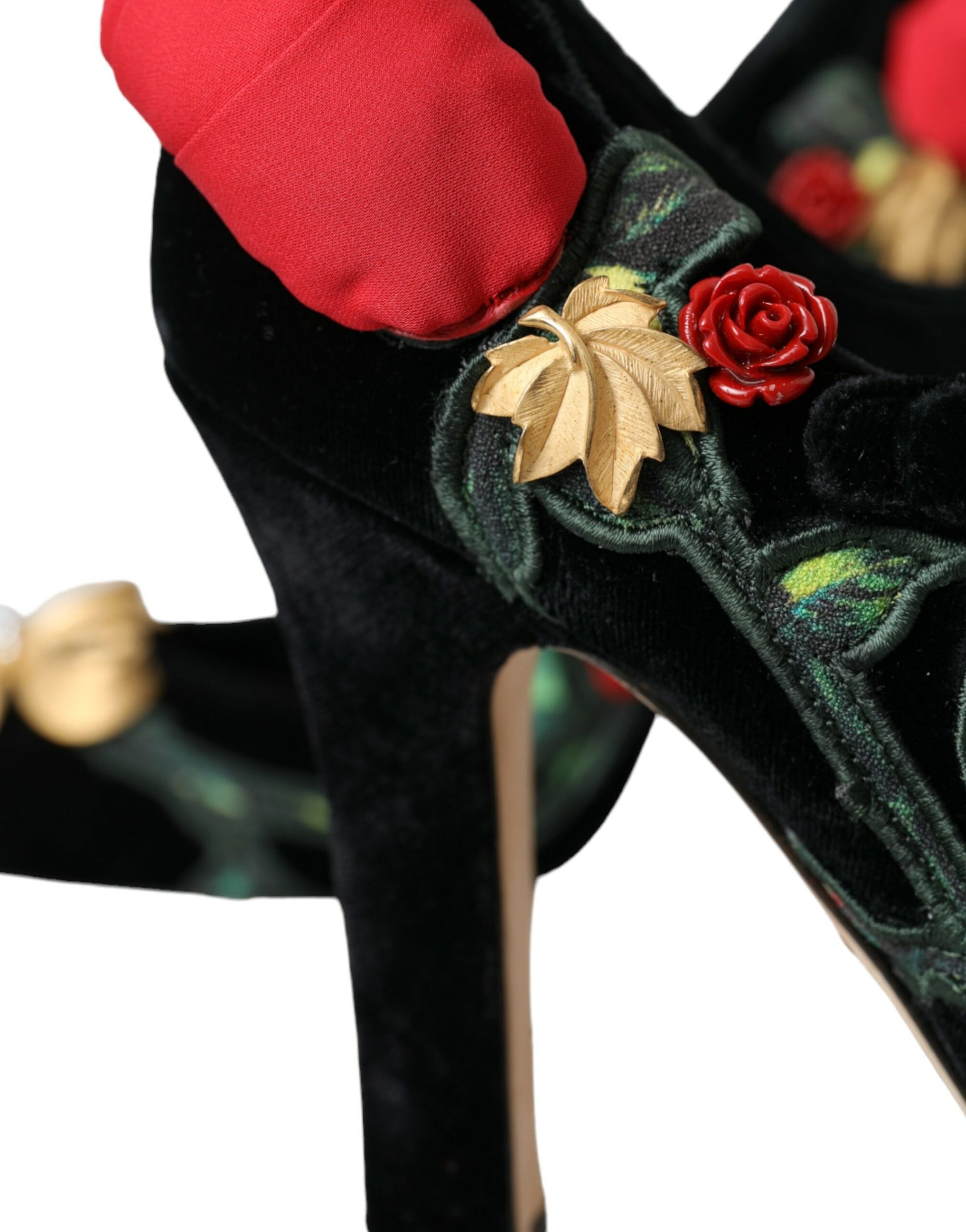 Pair of black velvet shoes with red flowers and gold accents