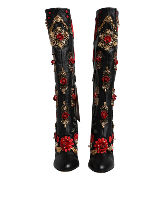Pair of black boots with red floral embroidery