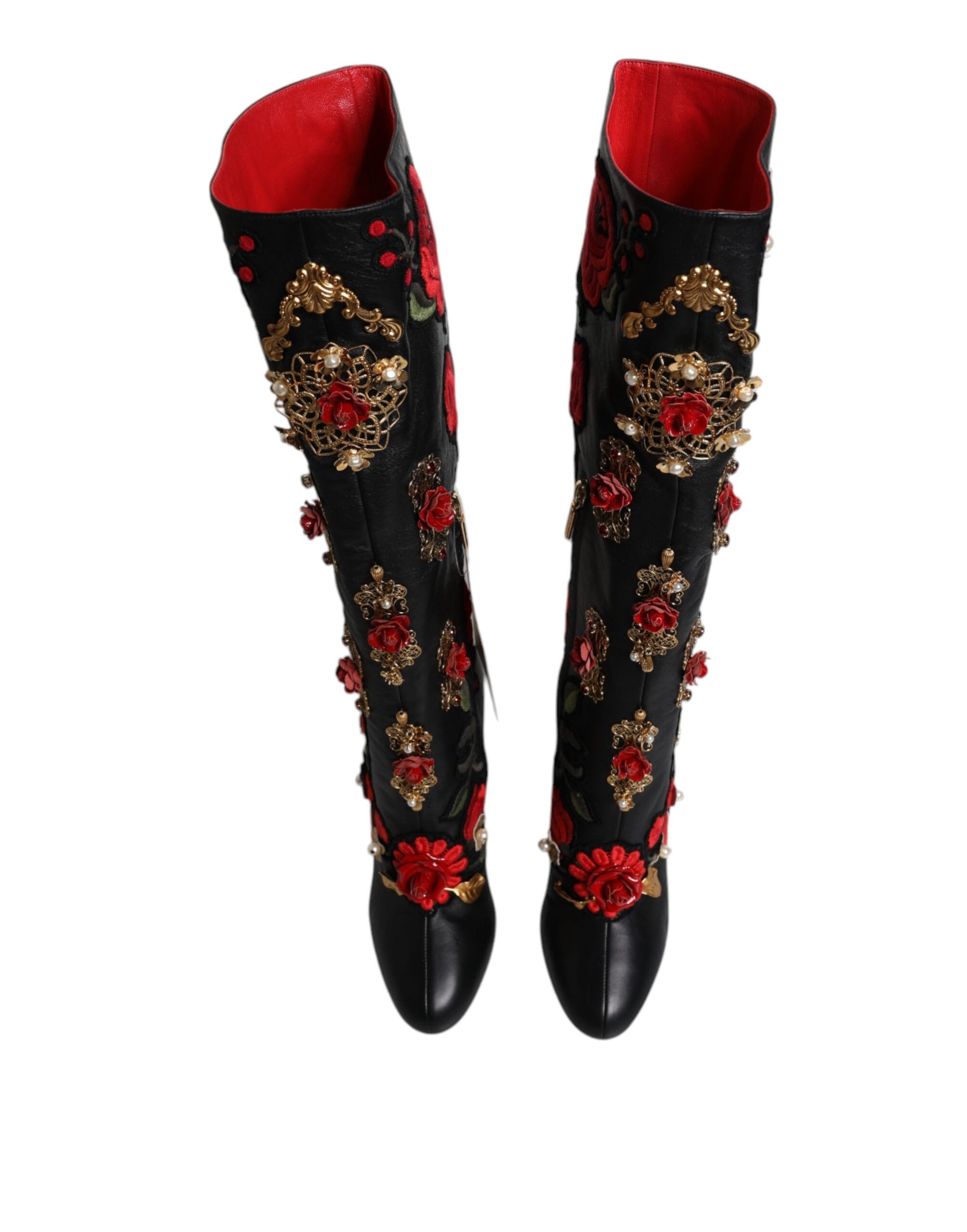 Pair of black boots with red floral embroidery