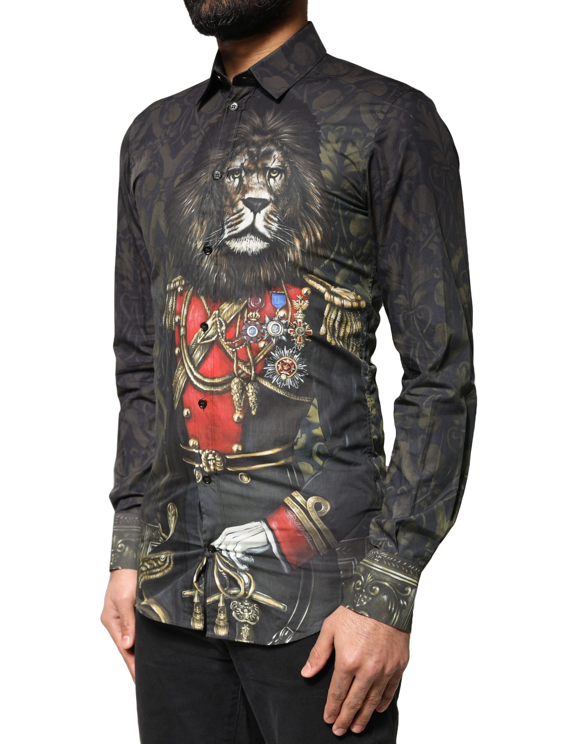 A black dress shirt with a gold portrait of a royal pet, featuring a lion and a crown