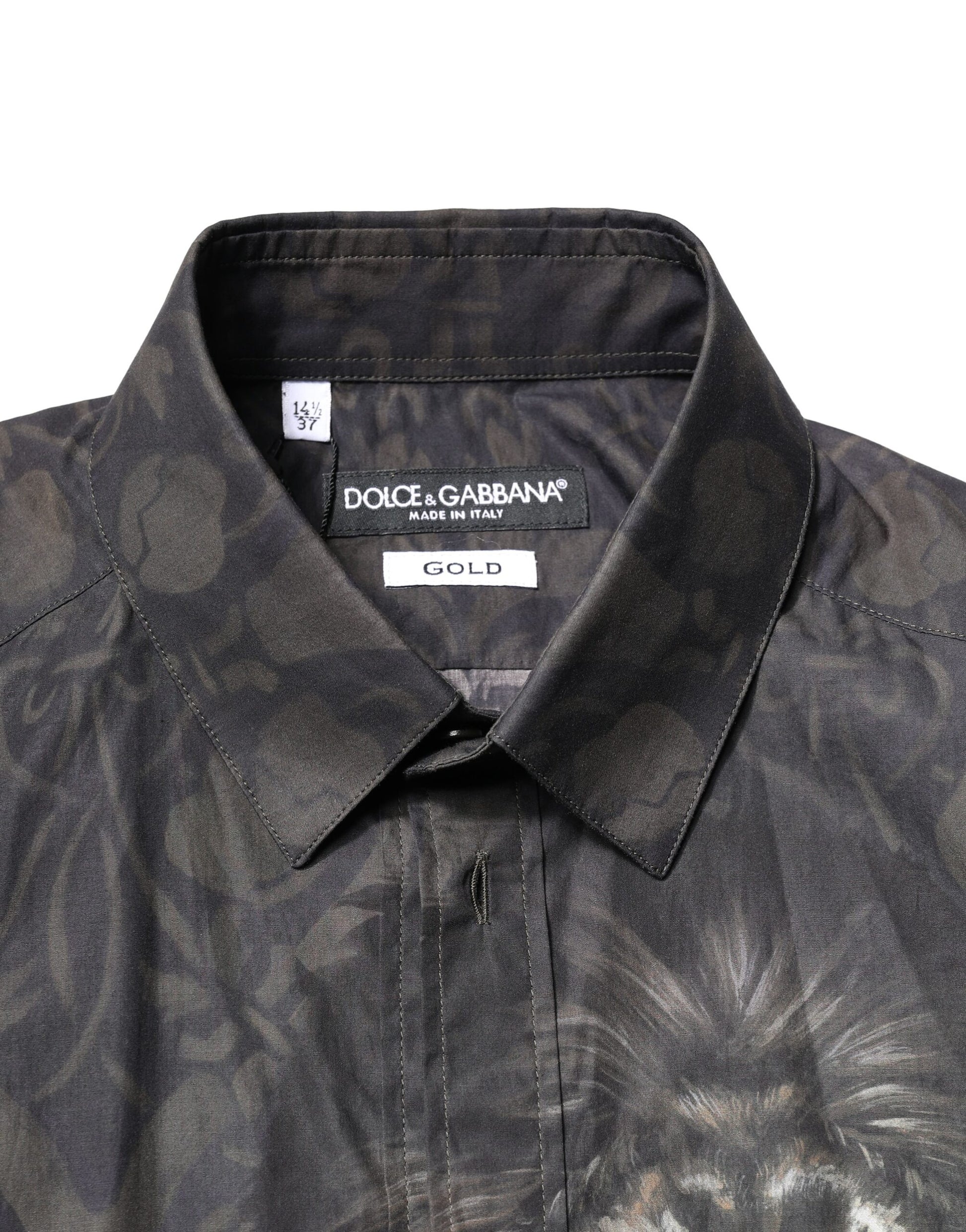 A black dress shirt with a gold pattern featuring a dog portrait