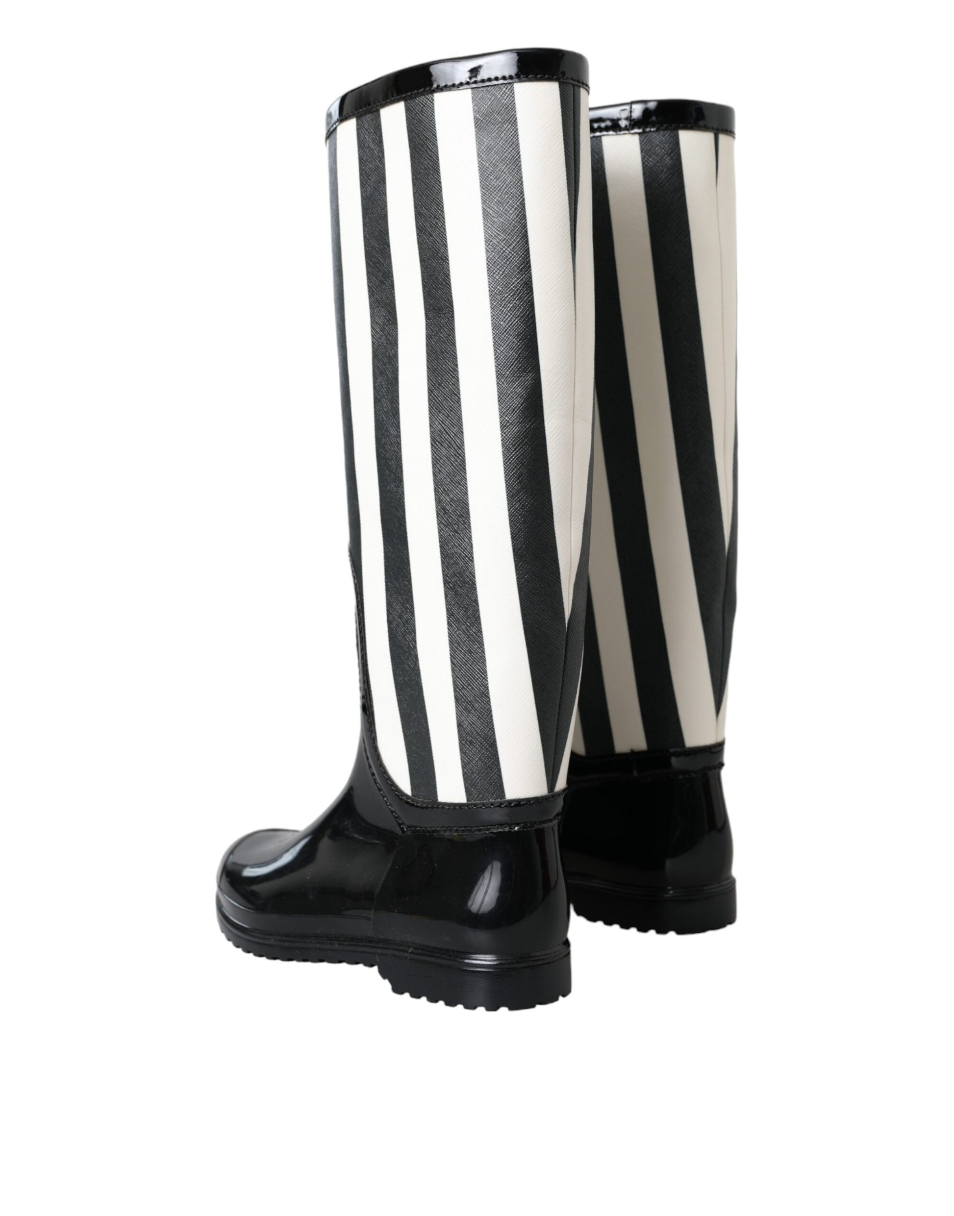 Pair of black rain boots with white stripes