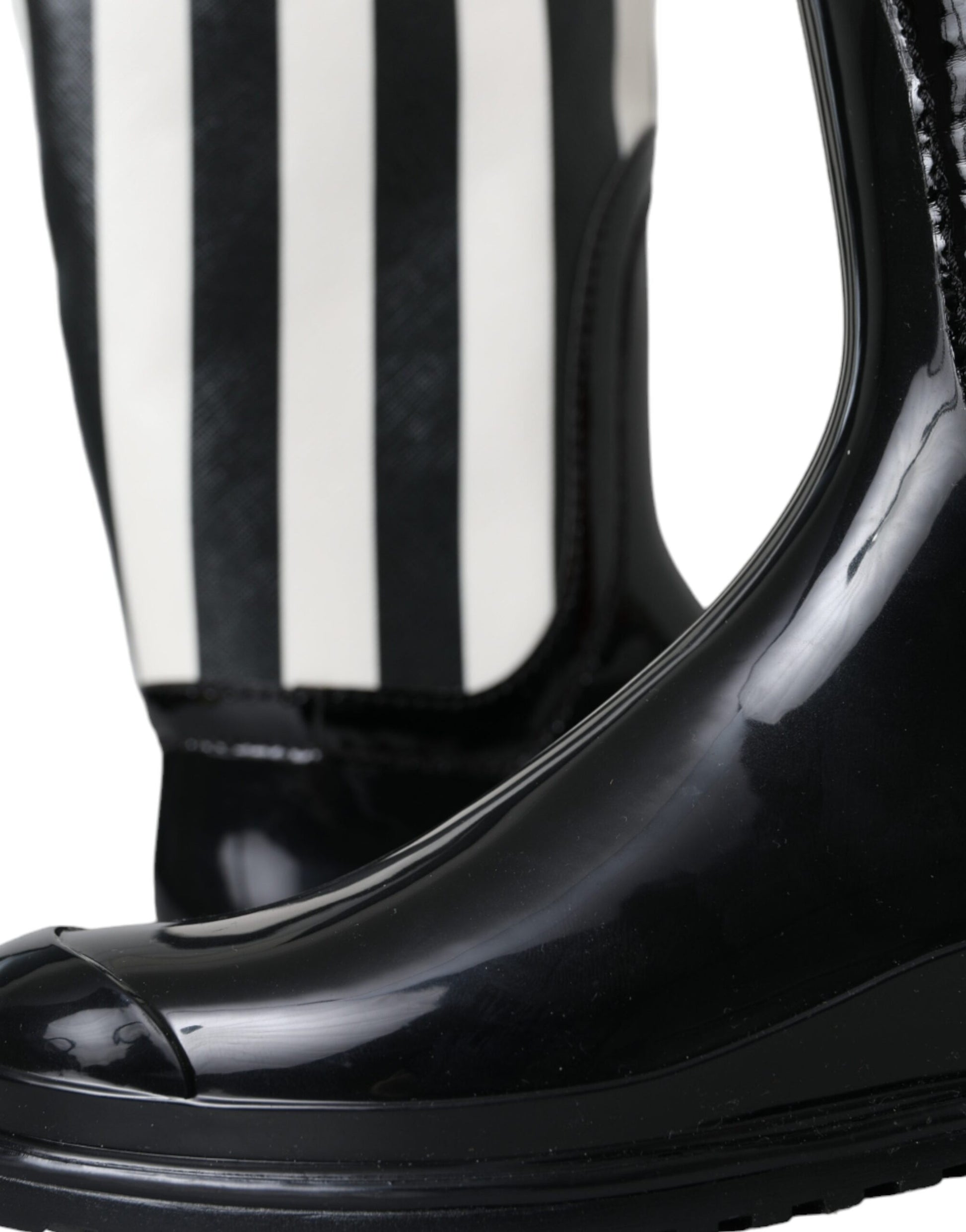 Black high heel boot with white stripes