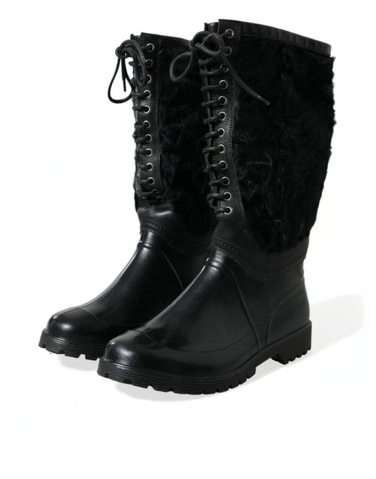 Pair of black boots with fur trim and laces