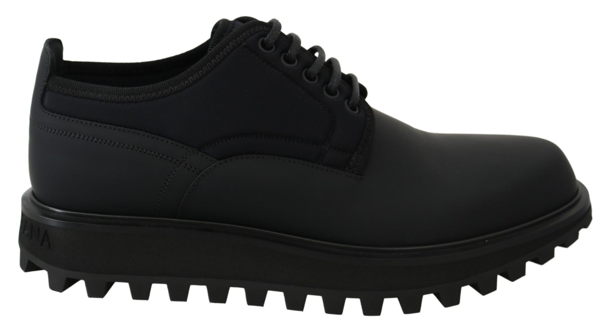 Black leather lace-up shoes with thick soles and a low heel
