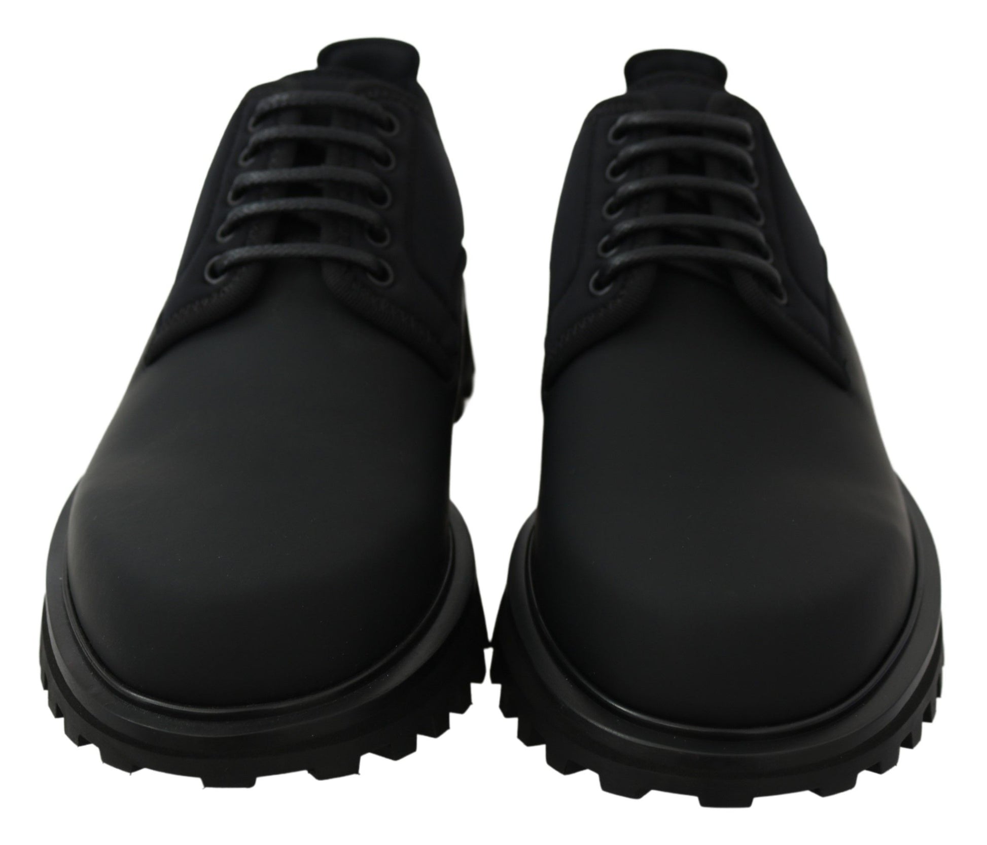 Pair of black leather shoes with laces and rubber soles