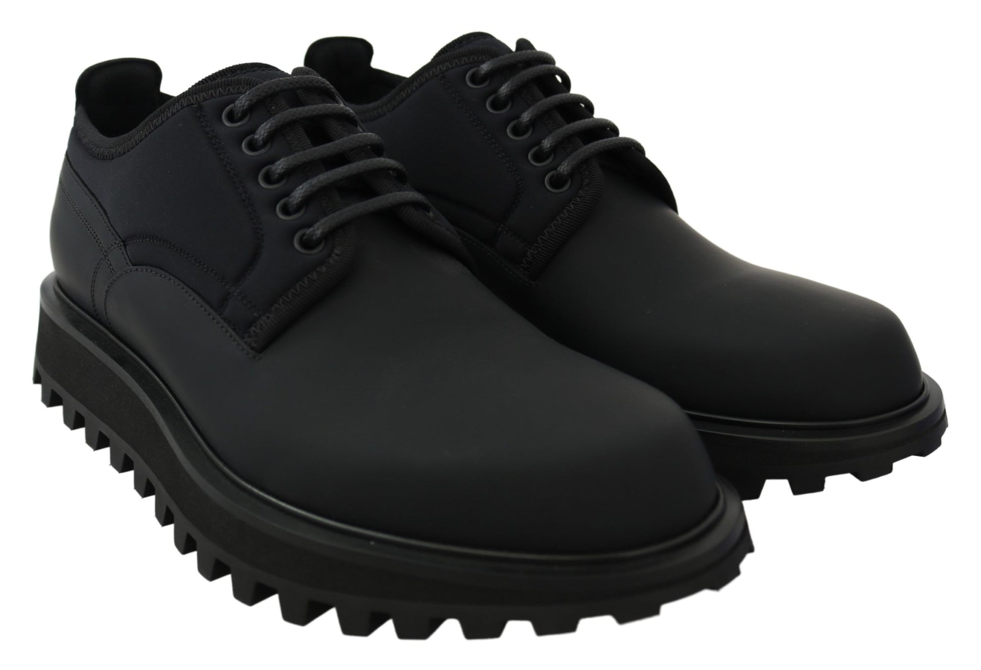 Pair of black lace-up shoes with rubber soles