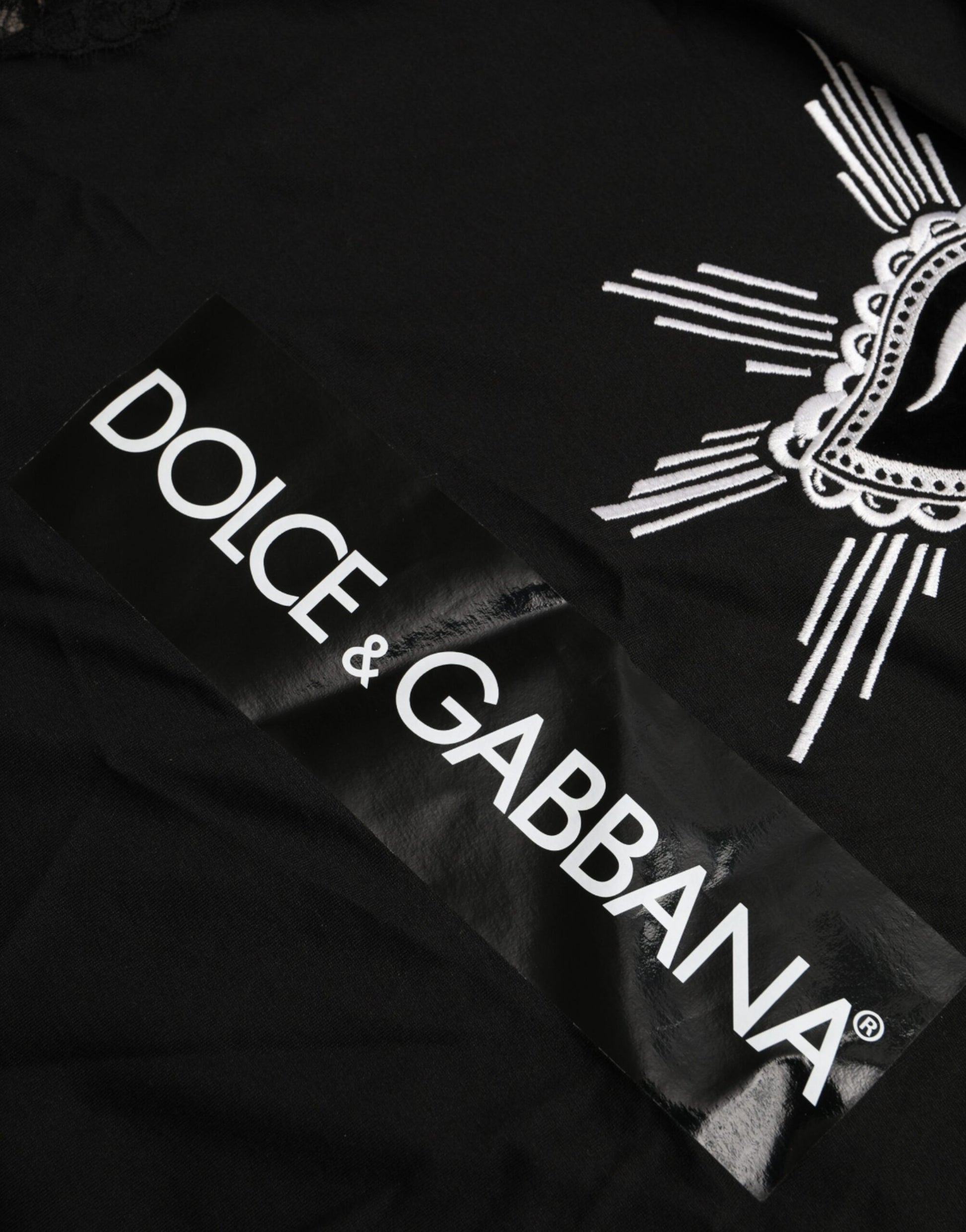 Black t-shirt with white logos for Dolce & Gabbana and D&G