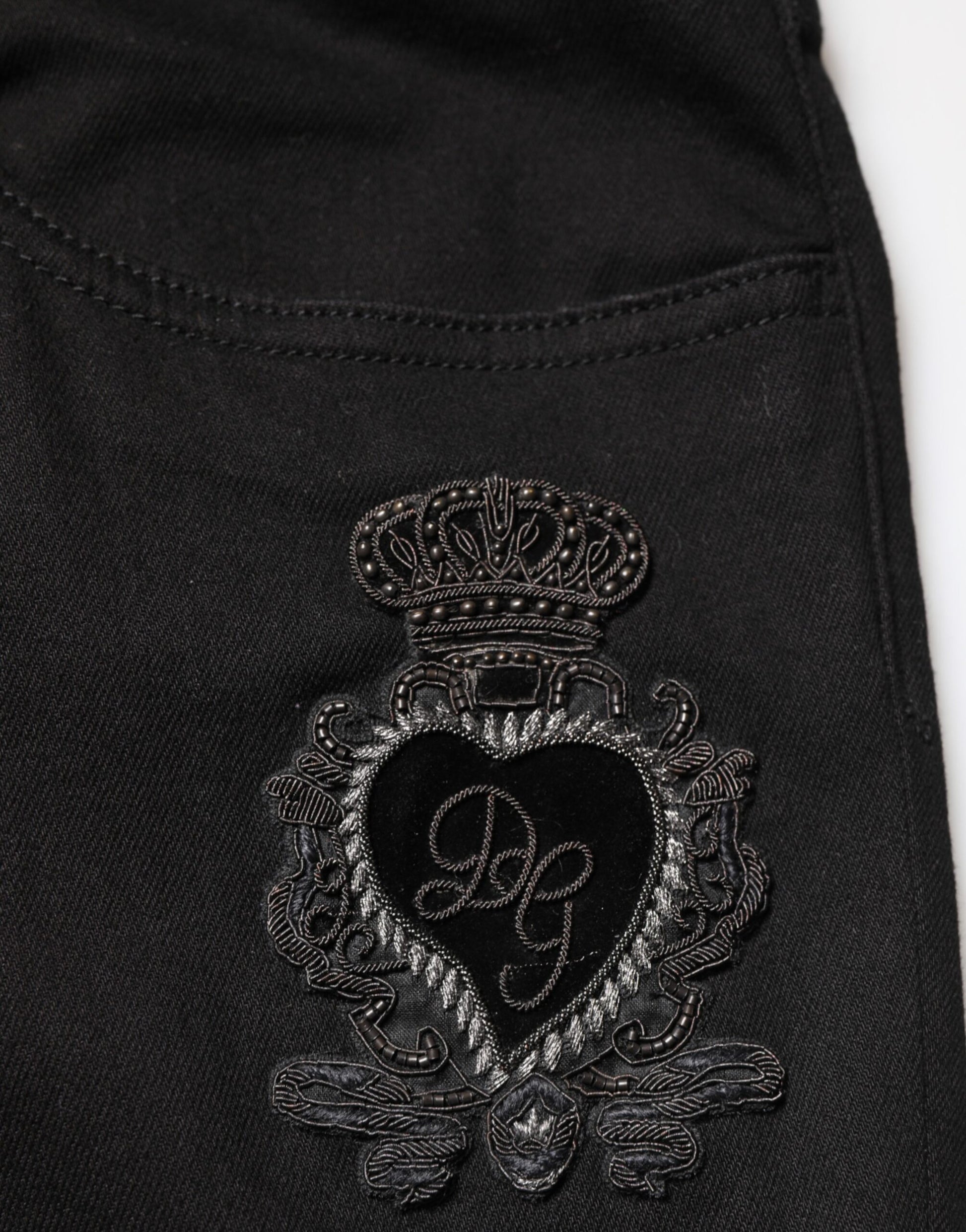 Embroidered emblem on black fabric