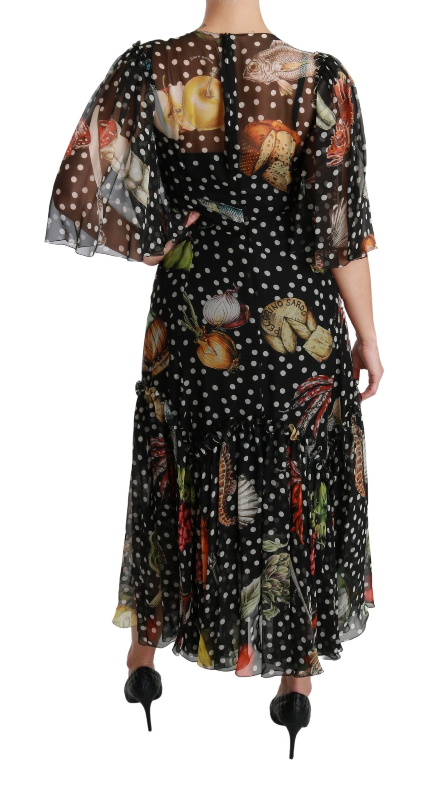 A black dress with a seafood print, featuring a V-neck and short sleeves