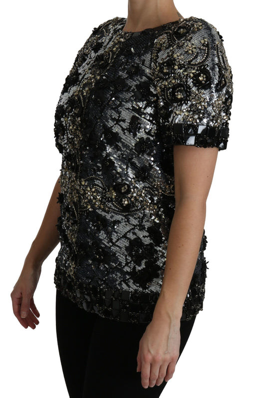 Black sequined top on woman