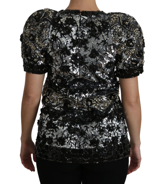 Black sequined top with puffed shoulders