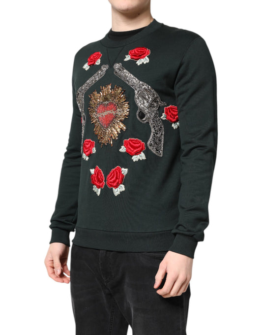 Man wearing black sweater with red roses on front