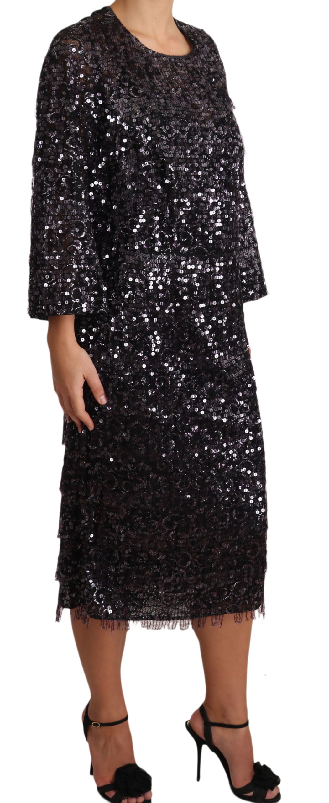 Black sequined dress with long sleeves and ruffled hem