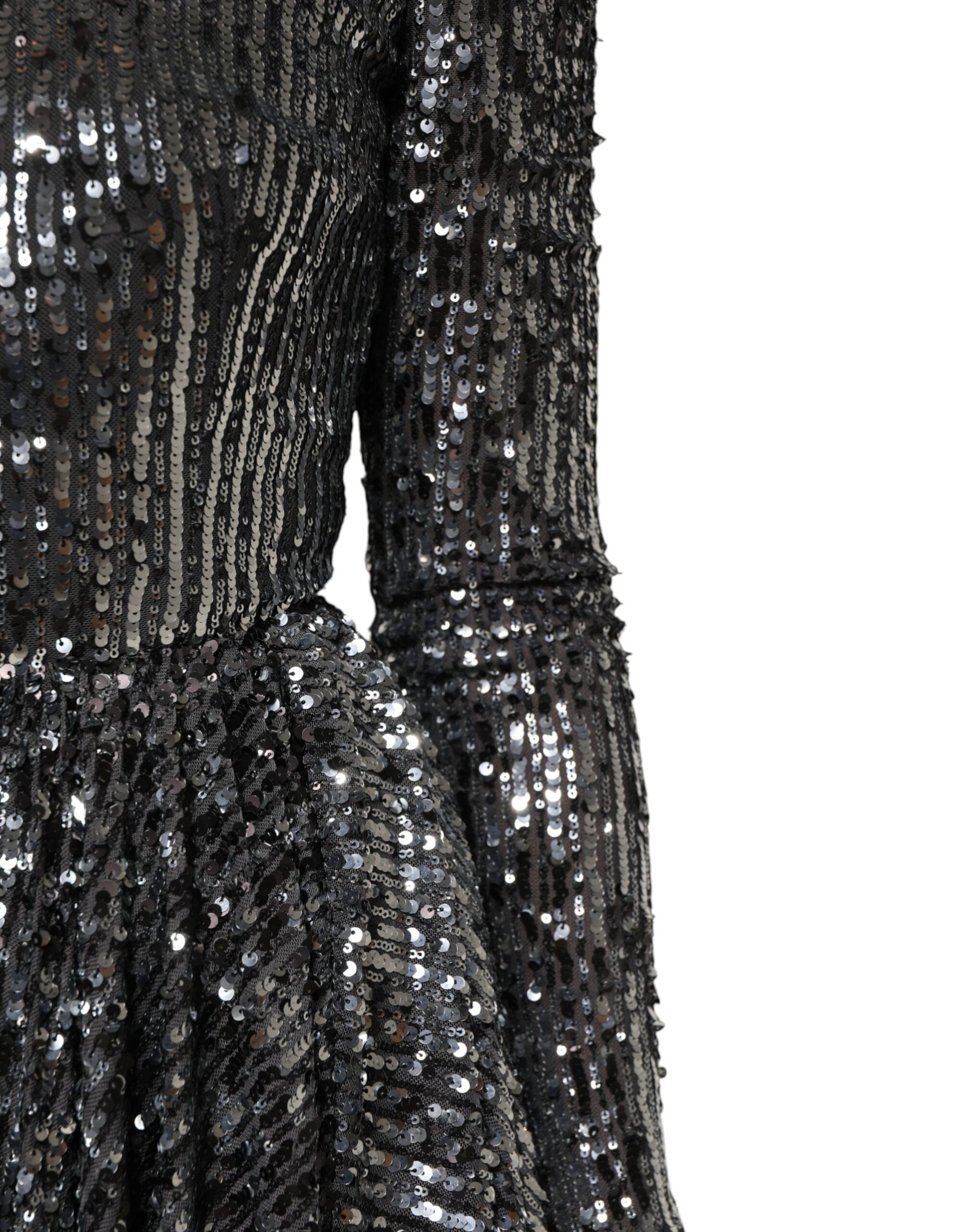 Black sequined long sleeve midi dress with A-line silhouette