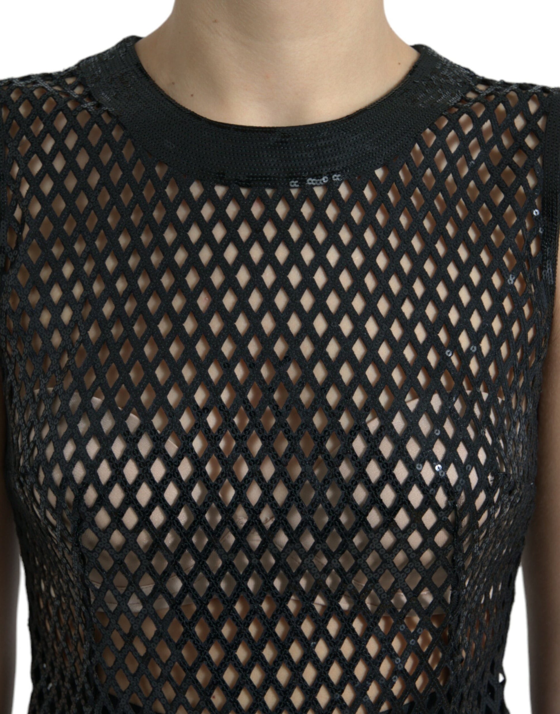 A black sequined mesh layered gown dress with a deep neckline