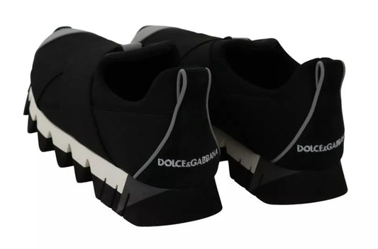 Pair of black sneakers with white sole and logo, featuring neoprene material