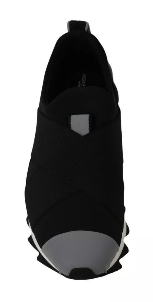 A pair of black neoprene stretch sneakers with a white logo on the side