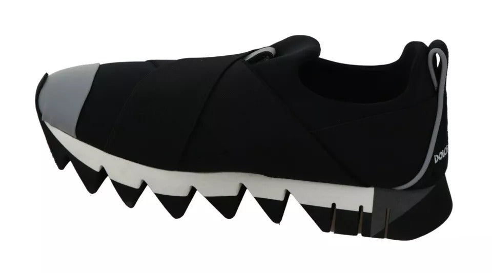 Black and white sneakers with shark teeth design on the side