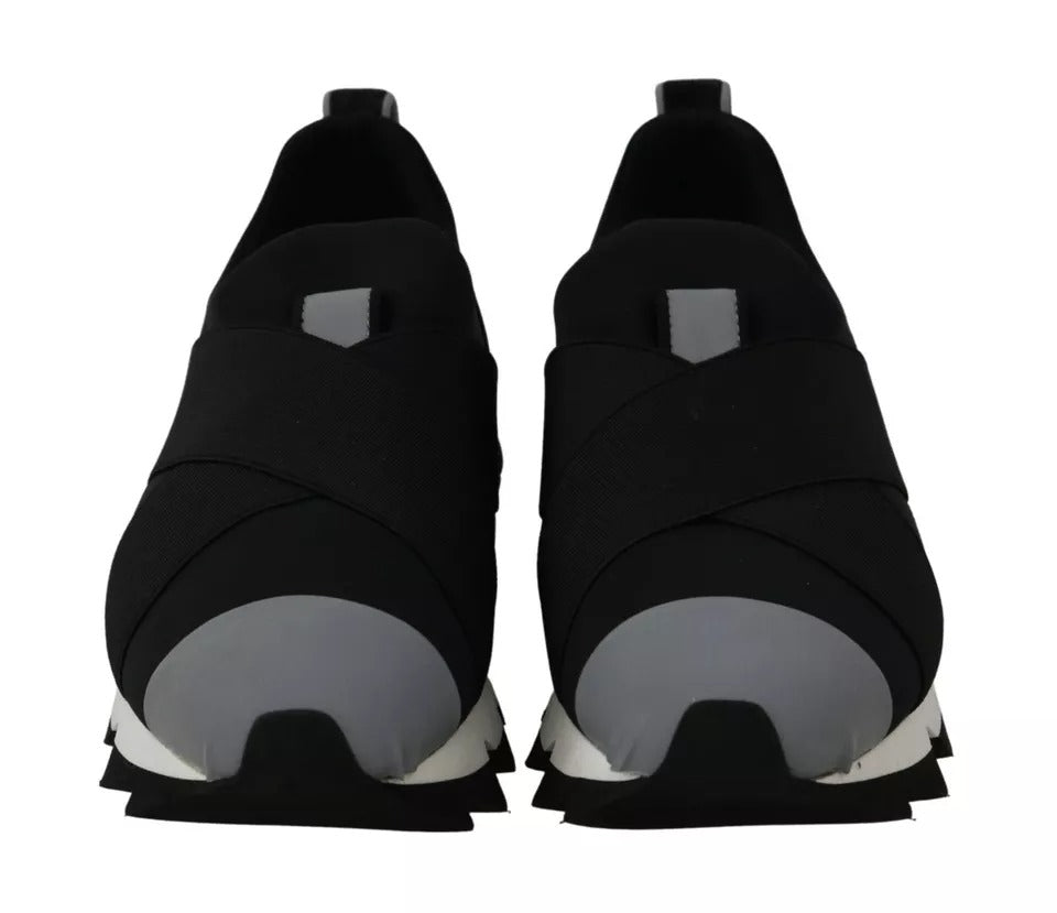 Pair of black neoprene sneakers with white soles, featuring a shark design