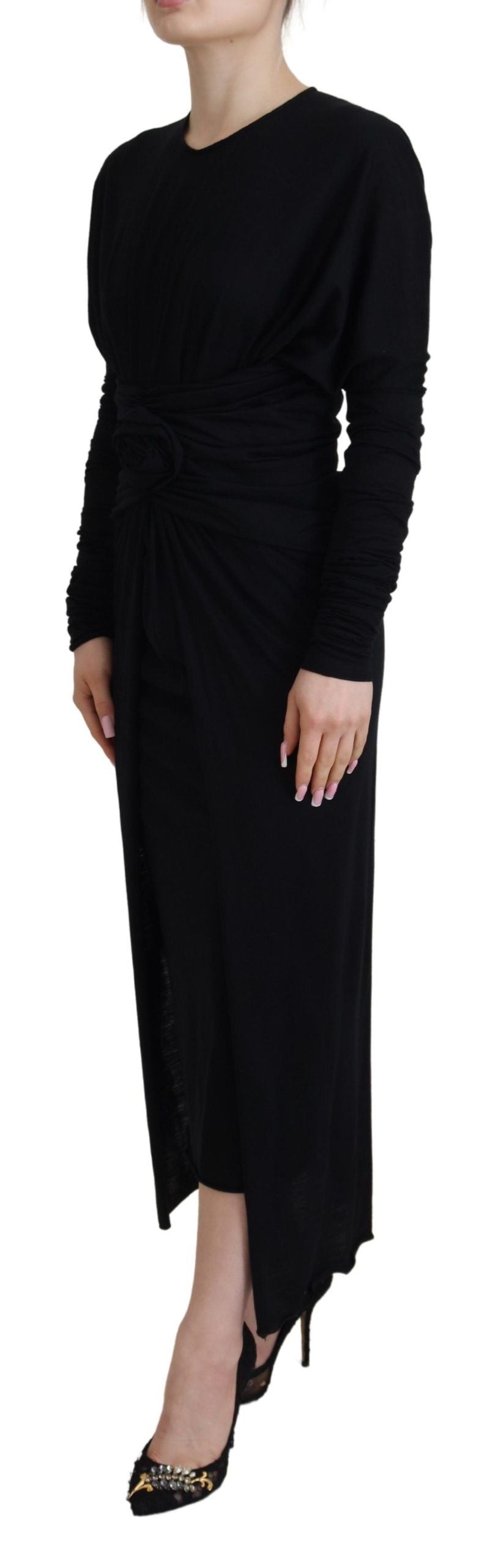 A black midi dress with long sleeves and a wrap style, featuring a wool material