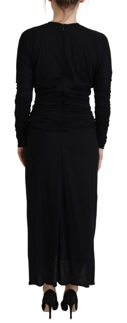 A black midi dress with a wrap style and wool material, featuring long sleeves and a sheath silhouette