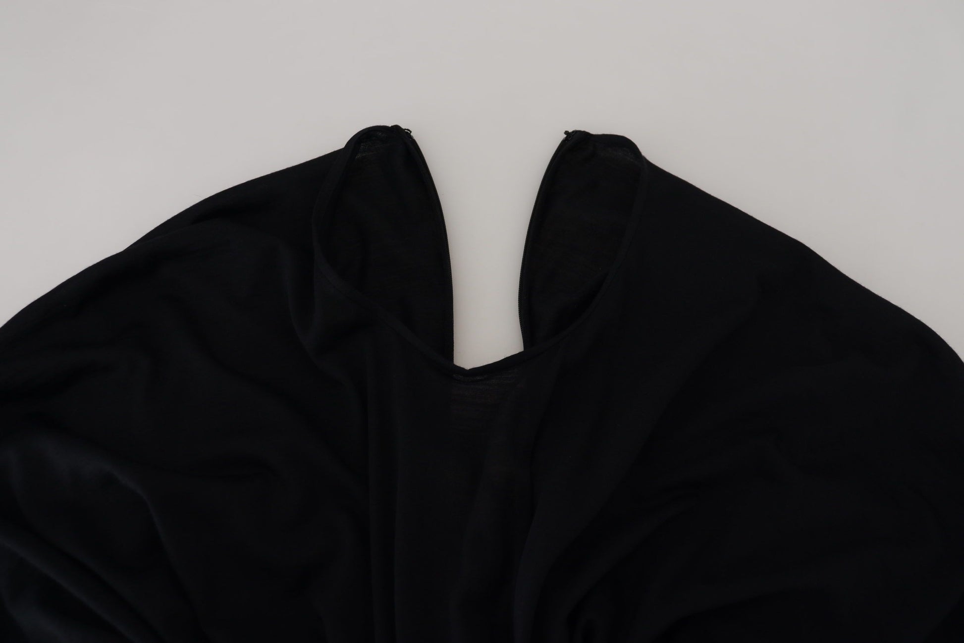 A black sheath midi gown with wool wrap detailing