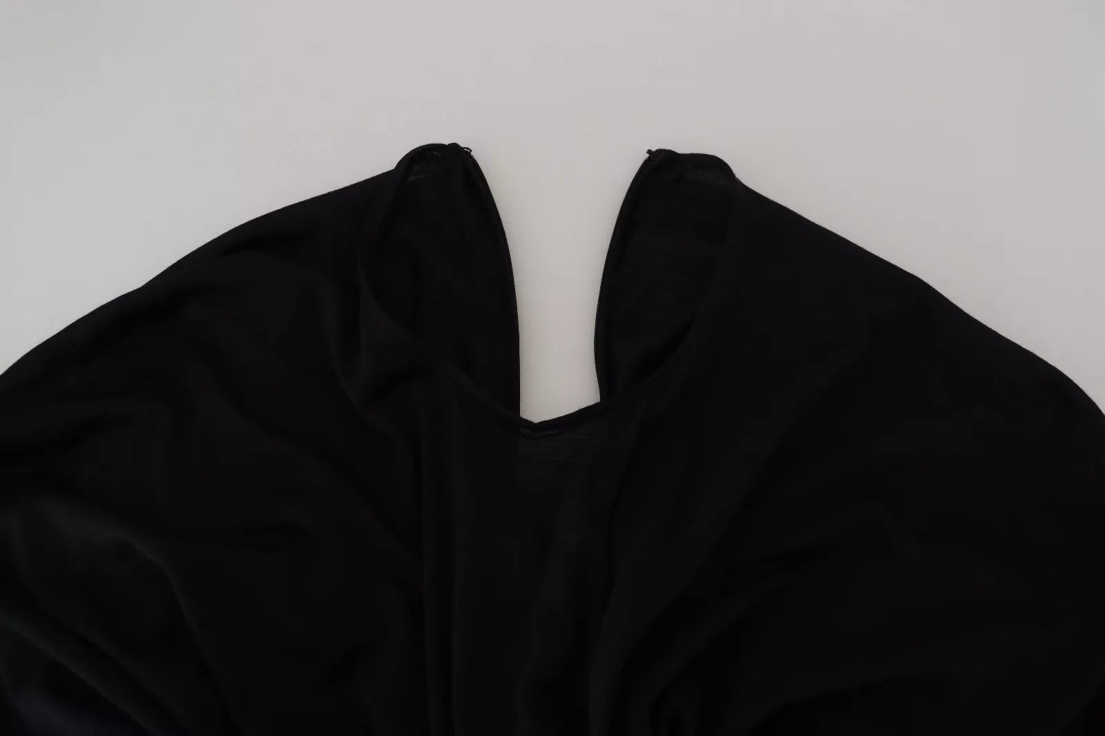 A black sheath midi gown with wool wrap detailing