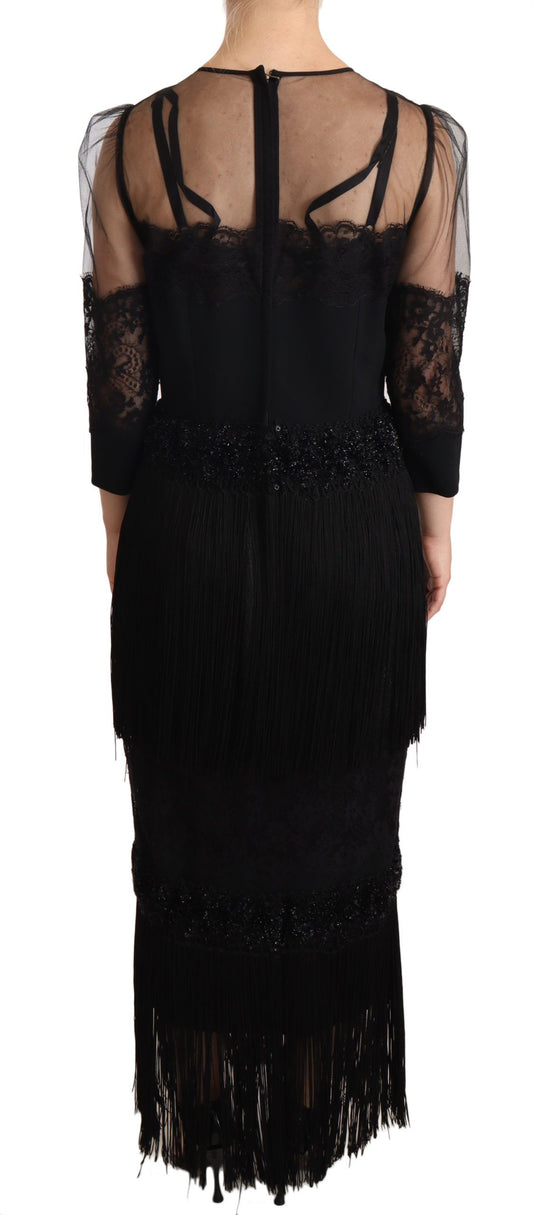 A black sheer lace crystal maxi dress with fringe details