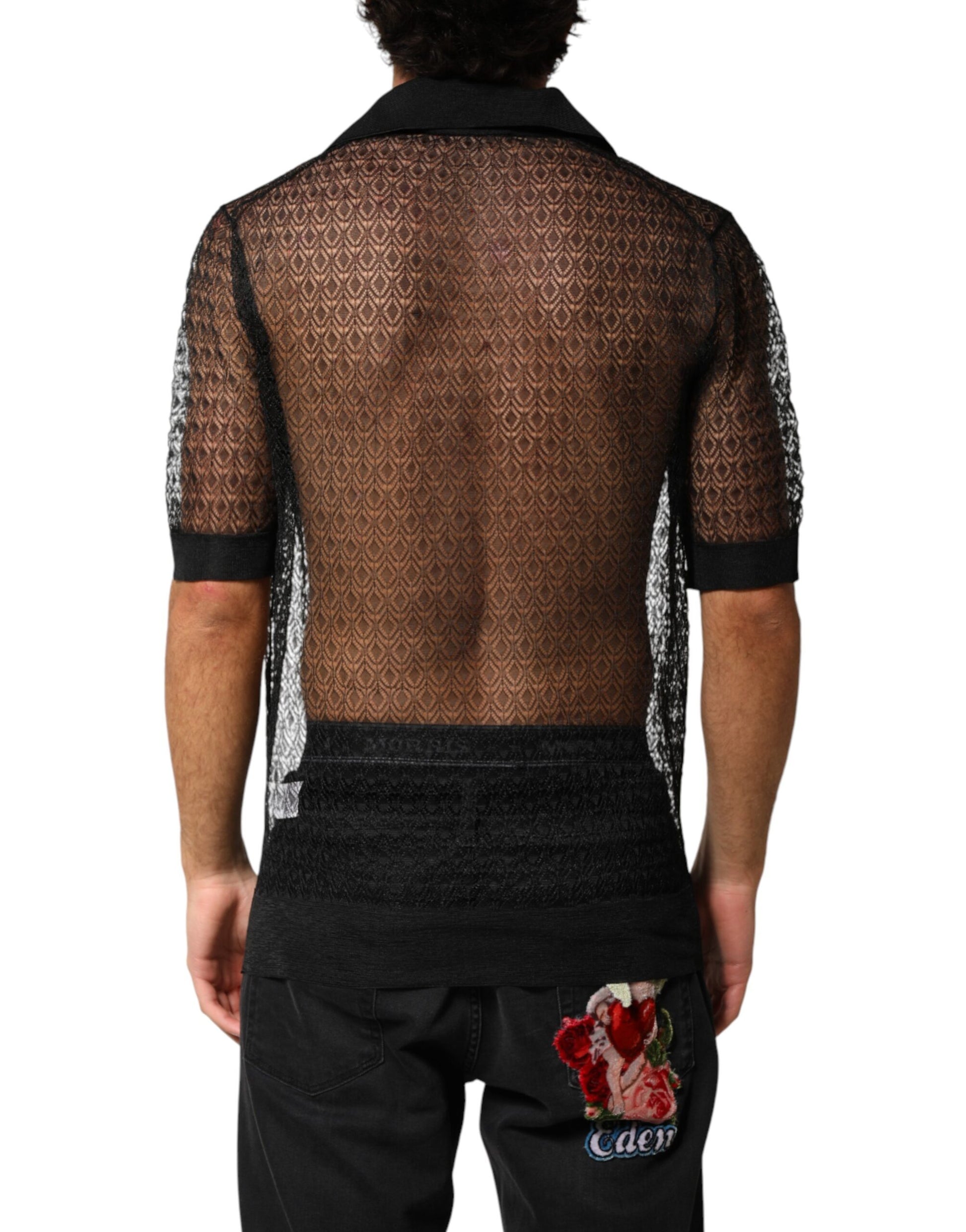Man wearing black mesh top with back exposed