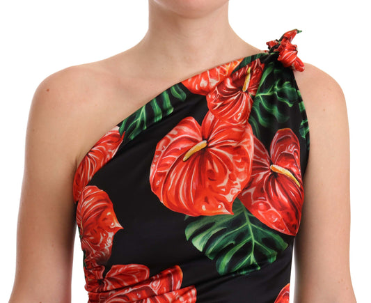 A black dress with a floral print on the bodice and sleeves