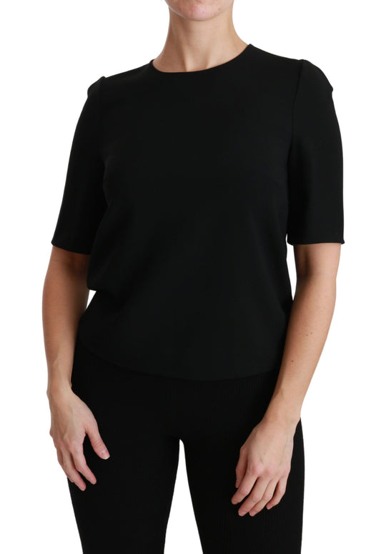 Woman wearing black top and pants