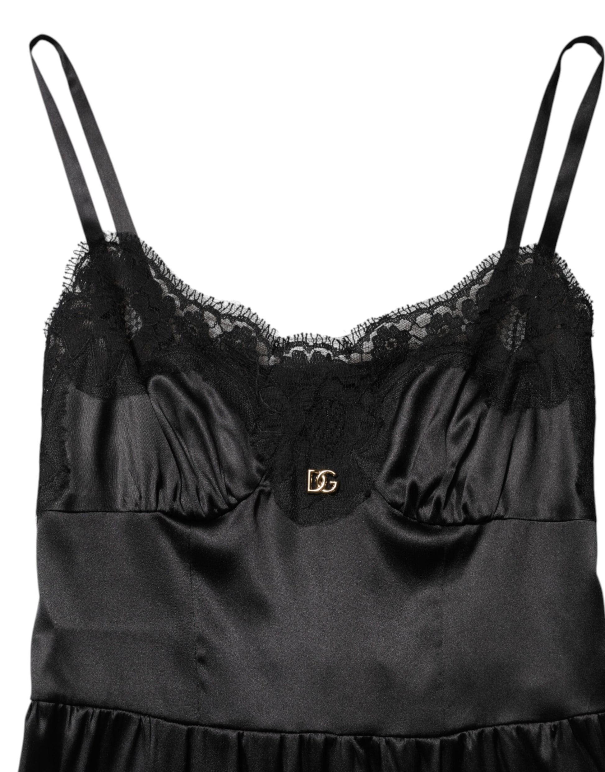 Black lace trimmed sleeveless mini dress with a sheer black blouse underneath