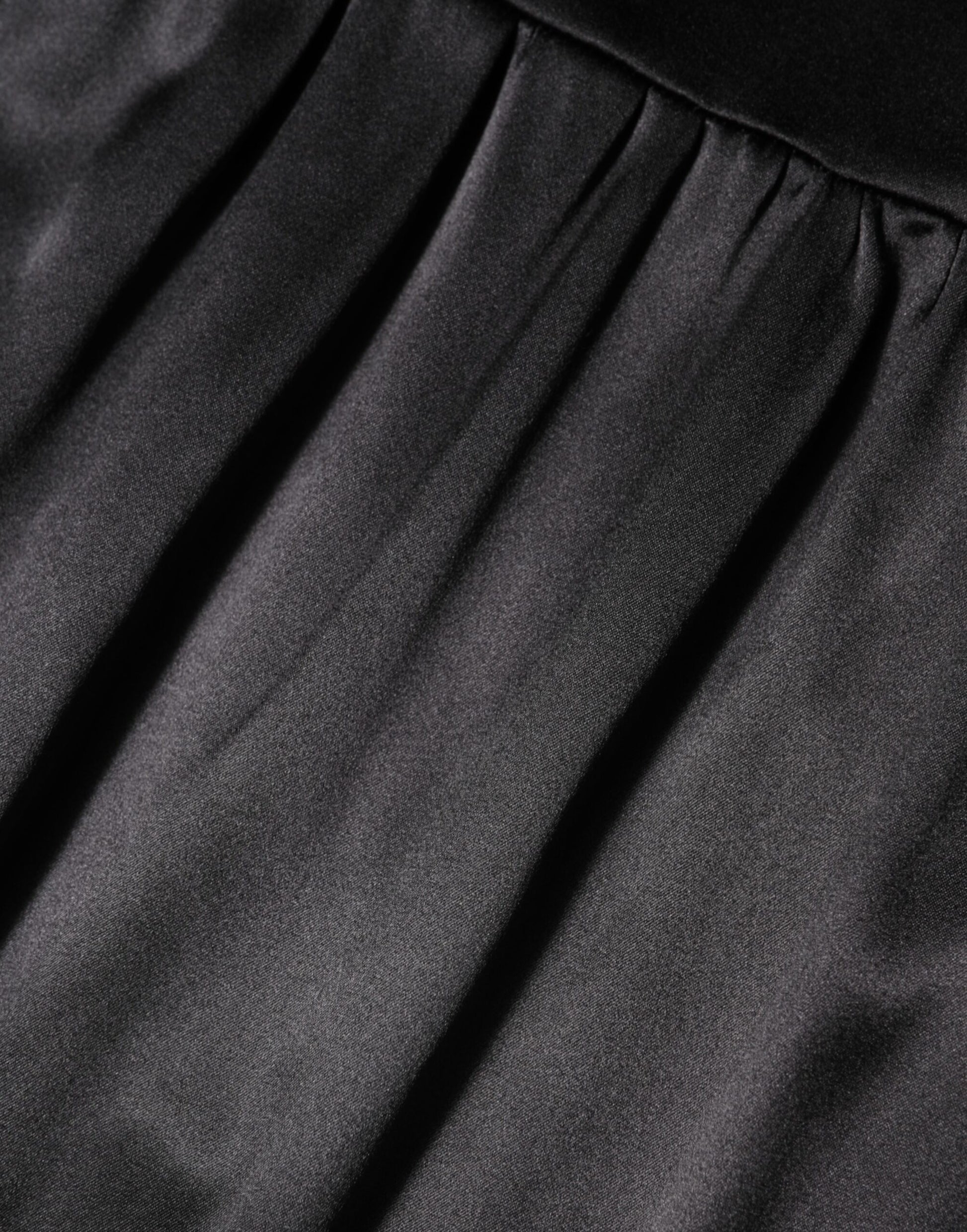 A black silk blend lace trim sleeveless mini dress