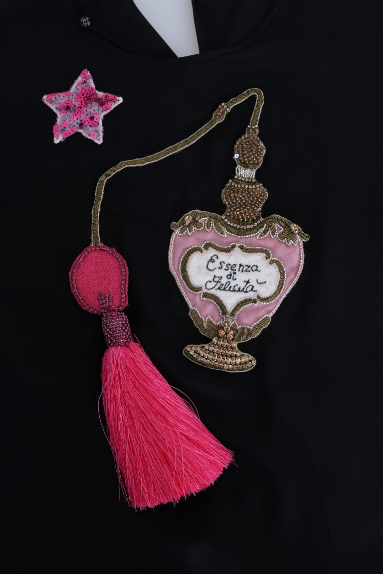 Decorative heart shaped charm on a black garment