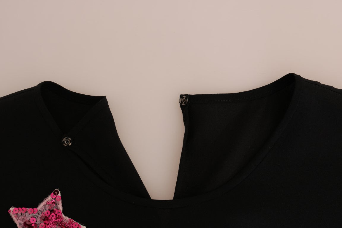 Black shirt on hanger