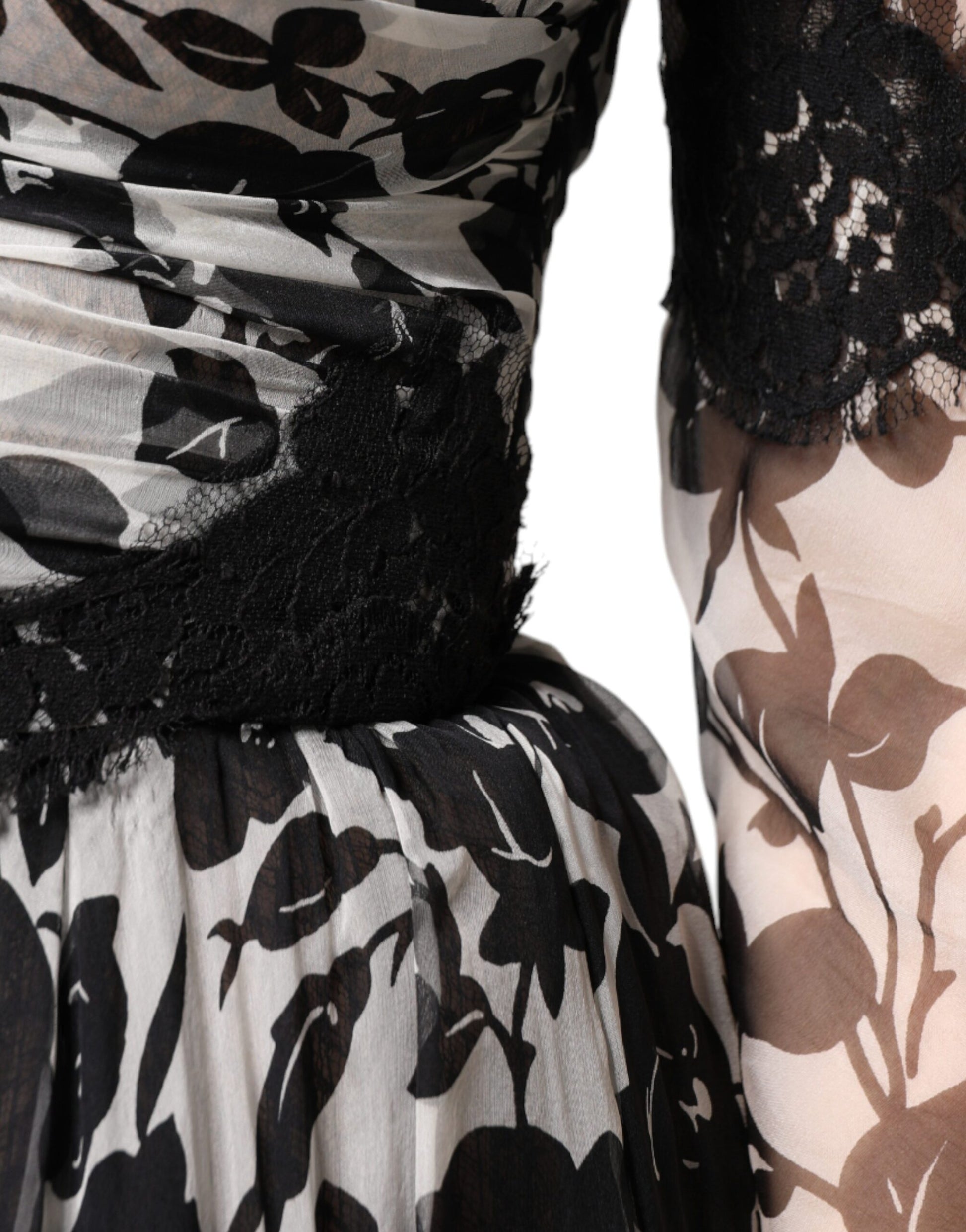 A black silk floral lace ricamo ball maxi dress with a fitted bodice and flared skirt