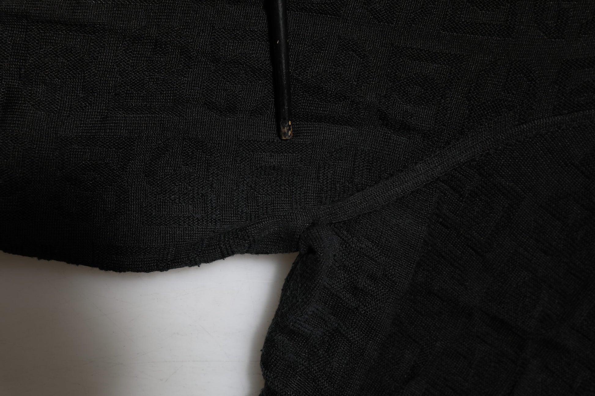 Black fabric on white surface