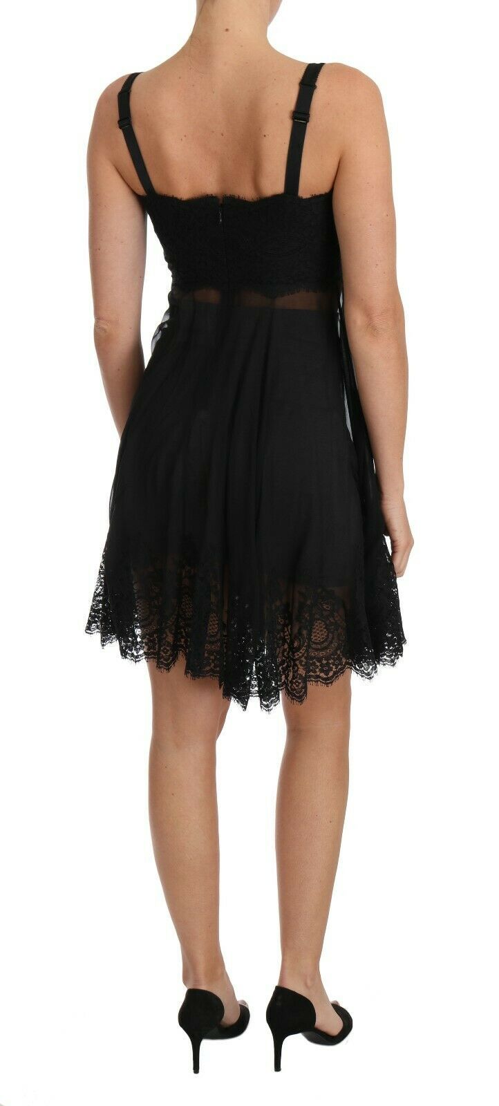 A black silk lace dress with a sheer overlay and high neckline, designed by Dolce & Gabbana