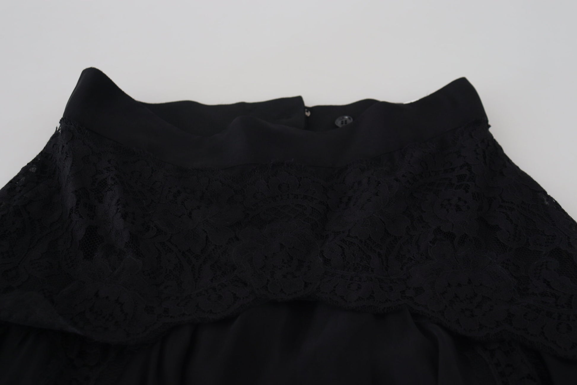 Black lace dress with ruffles on hem