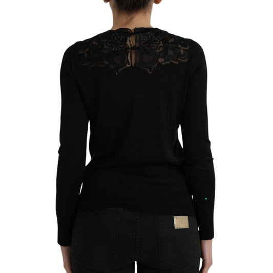 Black lace back sweater worn by woman